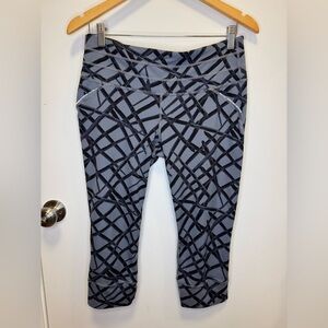 Athleta Women’s Splash Relay Capri leggings Leggings - Black and Flint Gray